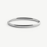 Silver bangle on a white background