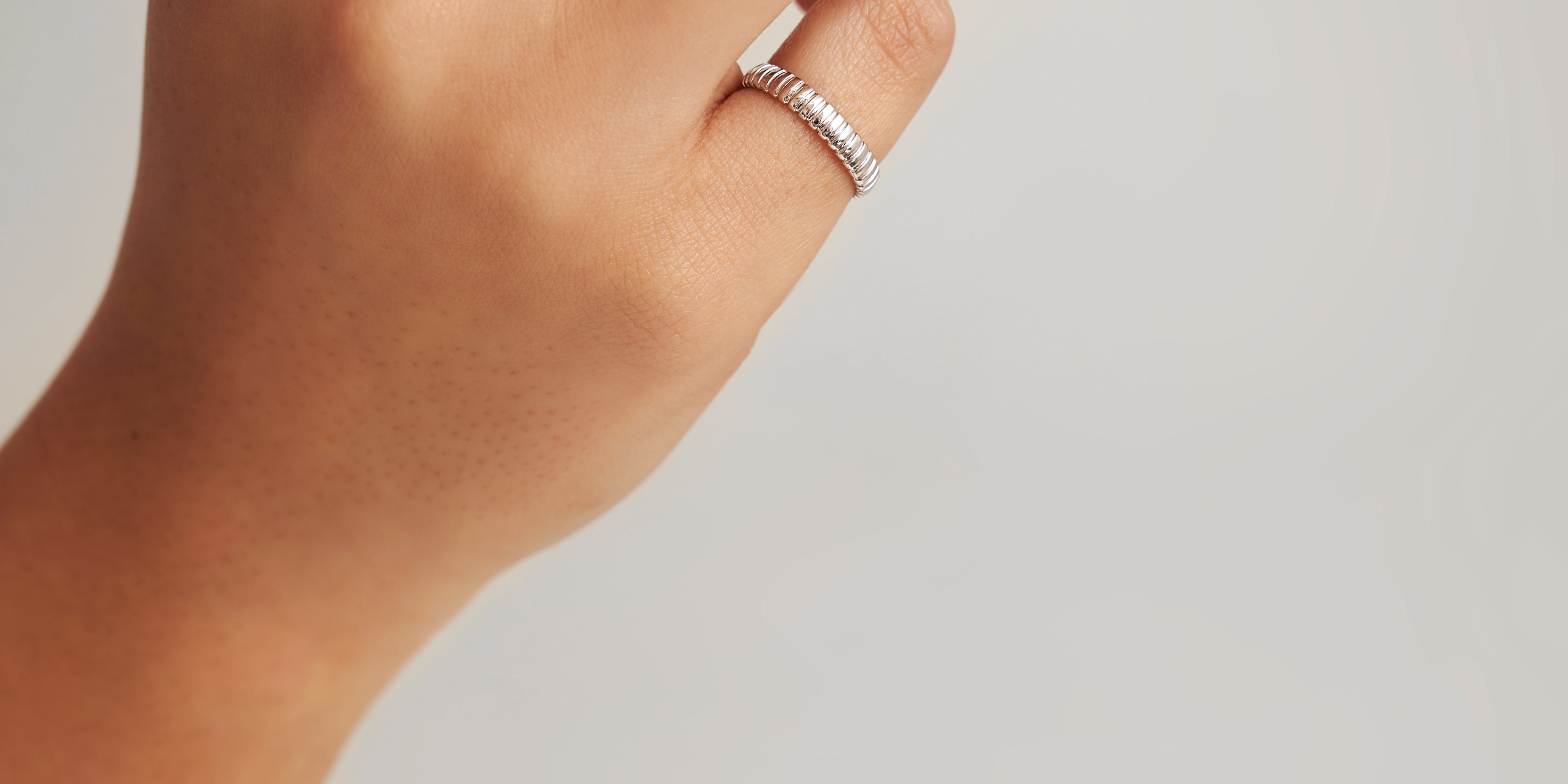 Tubogas ring with coiled design
