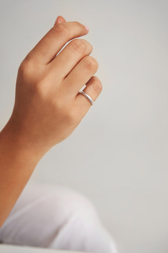 Tubogas ring with coiled design