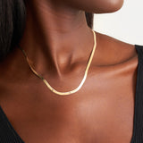Model wearing gold chain
