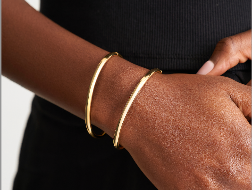 Oval shaped hollow bangle