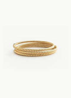 Solid Gold twist bracelet on a white background