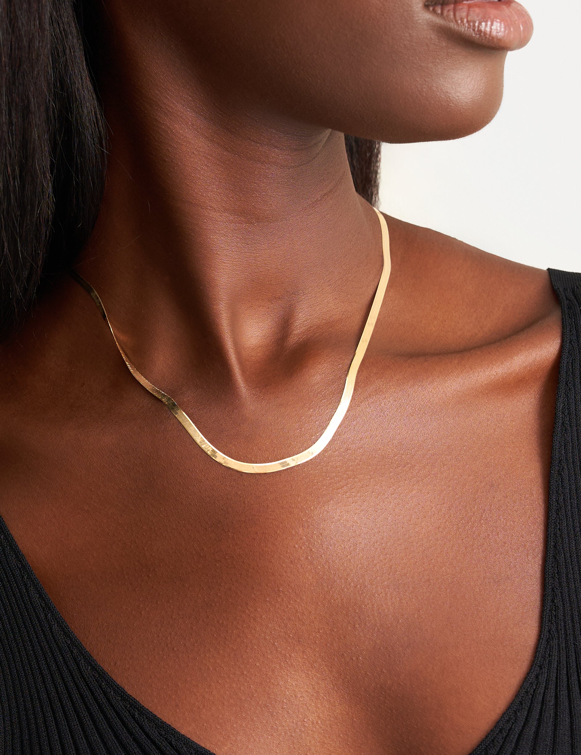 Model wearing gold chain