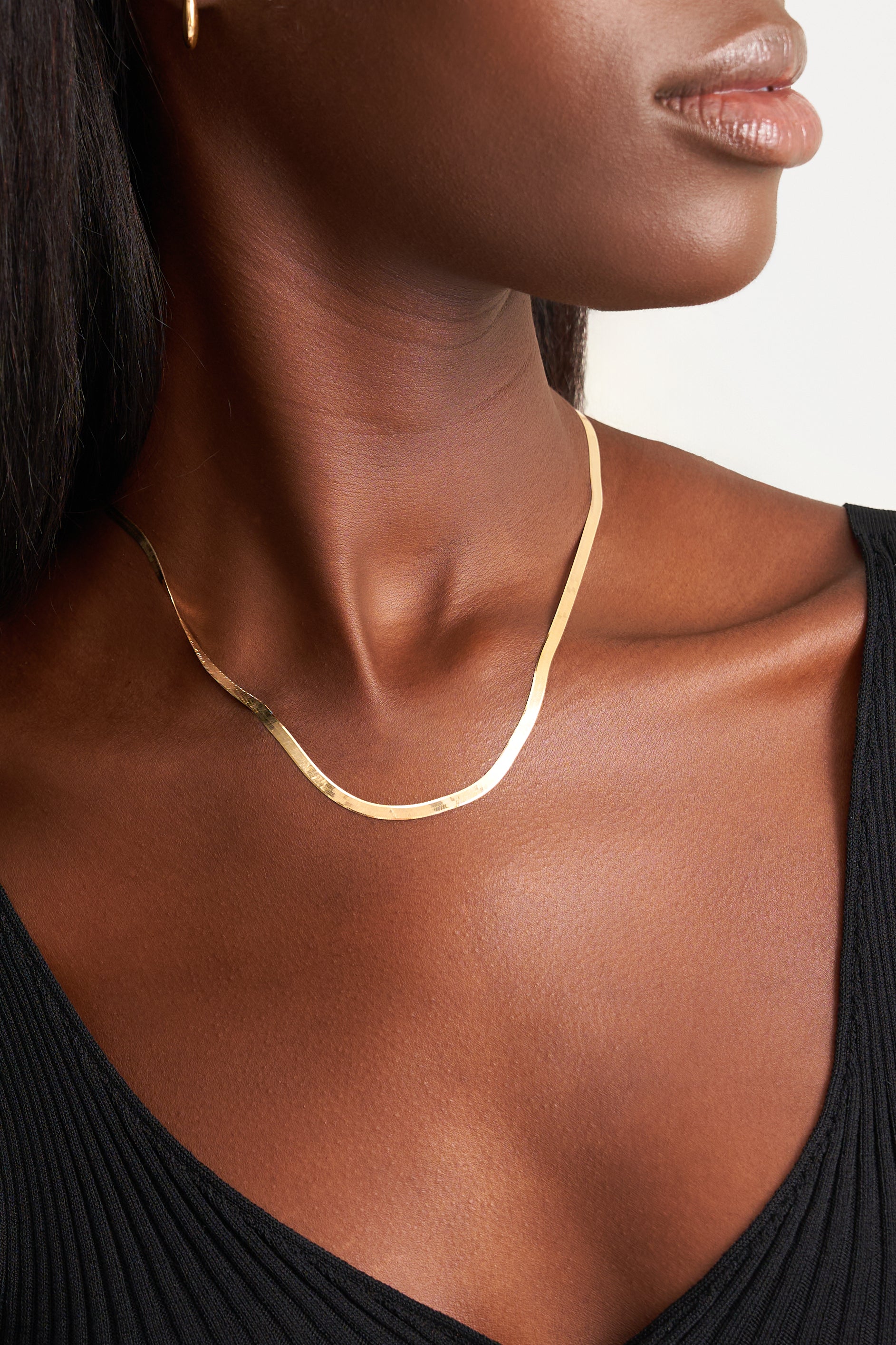 Model wearing gold chain